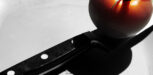 Messer und Tomate